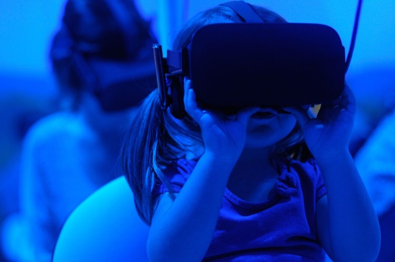 child with vr headset