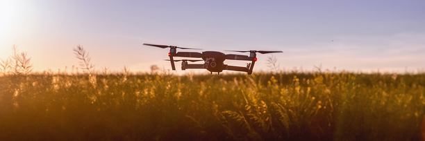 drone flying in field