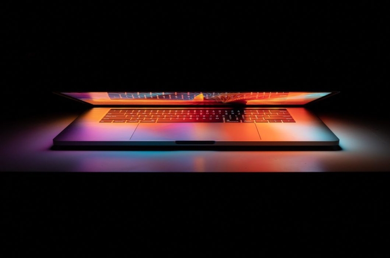 colorful laptop in the dark