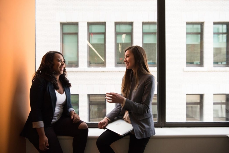 two women laughing